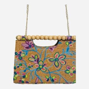 Floral Cork Satchel
Add a detailed touch to‎ your look with this beautiful bag